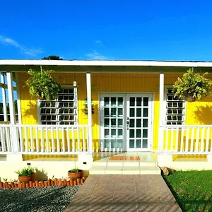 https://la-casita-amarilla.comcaribbean.com